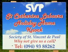 St. Catherine Labouré Holiday Home sign